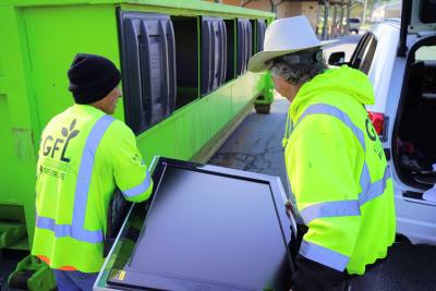 Volunteers recycle a television at the Cobb County Office of Sustainability / Keep Cobb Beautiful's Spring 2025 Community Recycling Event 