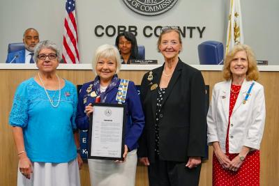Commissioner Birrell presents proclamation to members of the Daughters of the American Revolution.