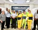Seven graduates from Sheriff's GED program with staff
