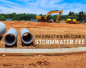 picture of stormwater pipes and heavy equipment