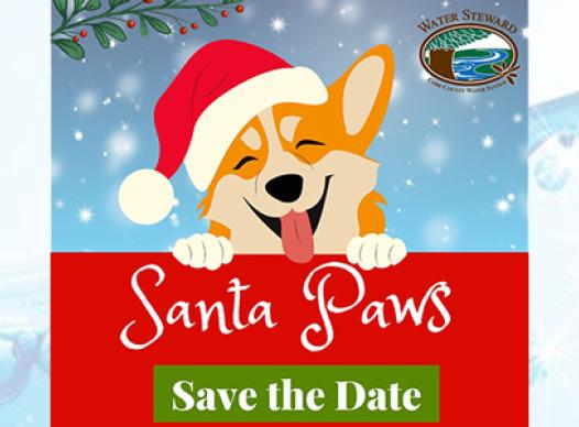 cartoon drawing of a dog holding a sign that says Santa Paws and Save the Date
