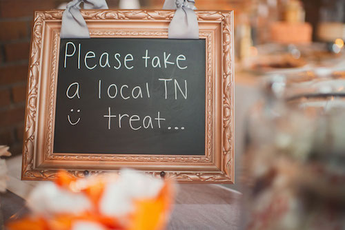 Sign saying please take a local TN treat