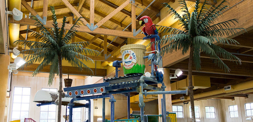 Top of the jungle gym with large bucket that fills with water