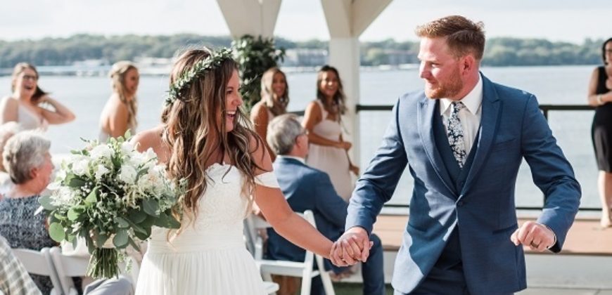 Bride and Groom walking back down the aisle after getting married