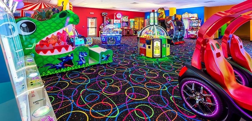Arcade with an alligator game and a racing game