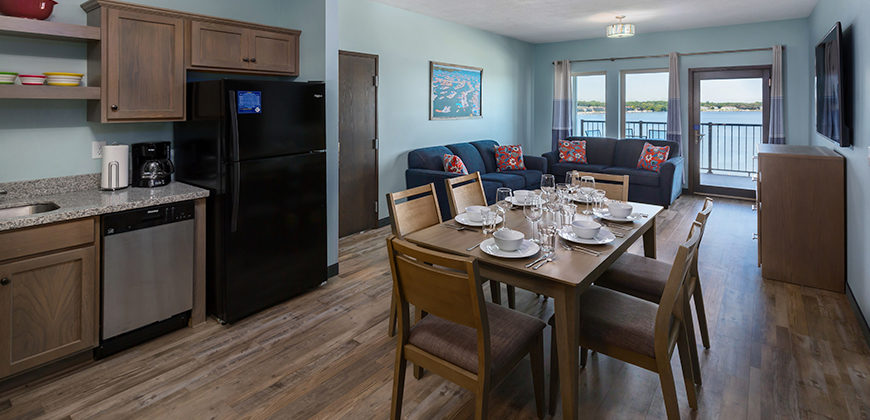 Kitchen and Dining Area. Dining table set for supper