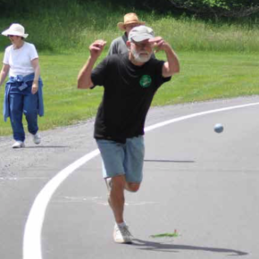 Group of people playing bocce ball