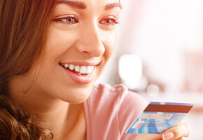 Woman holding credit card