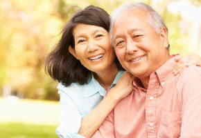 Mature man and woman smiling