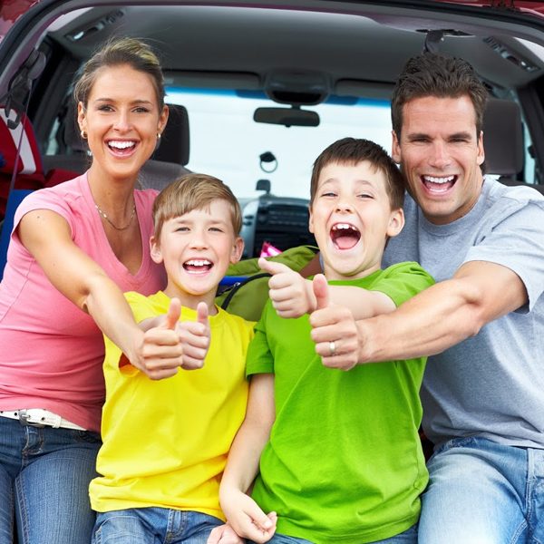 Family giving thumbs up