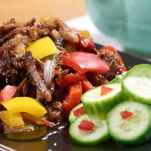 Pressure cooked pepper steak close