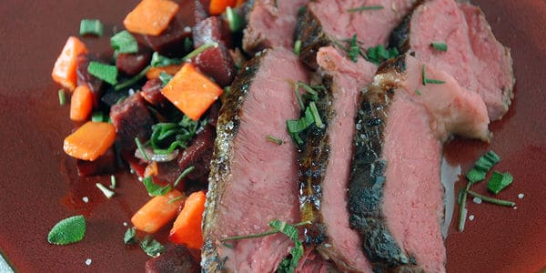 Sous vide sirloin roasted vegetables top