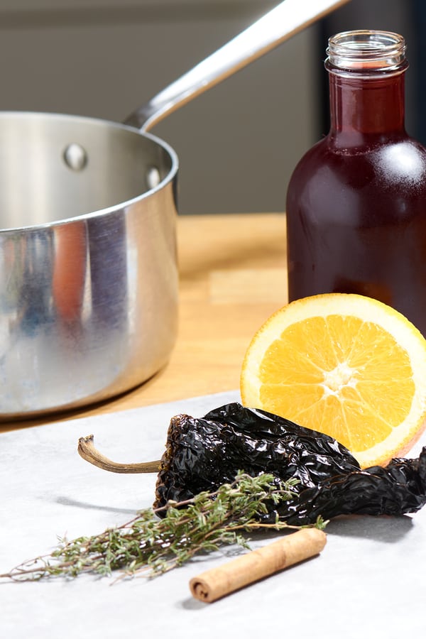 Sous vide rack lamb pomegranate sauce v