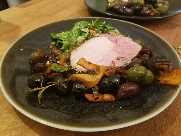 Sous vide pork loin olives plated