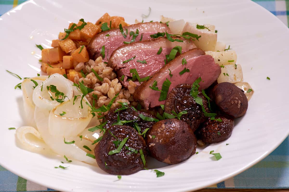 Sous vide duck farro bowl close