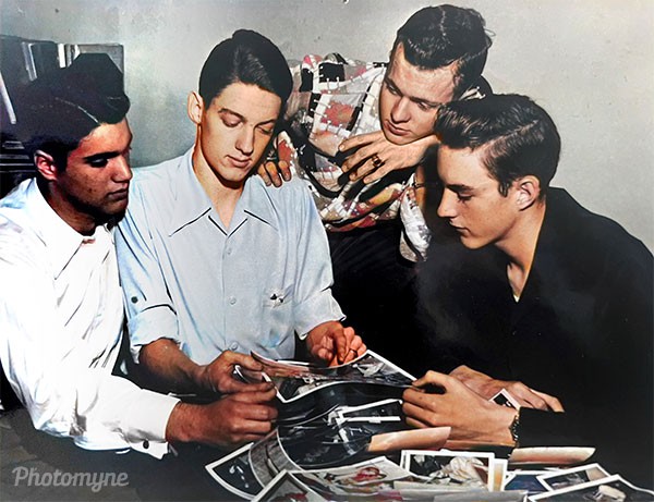 Yearbook staff choosing photos. 1955