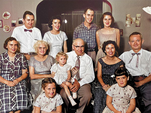 Beverlys family. A moment of everyone coming together for the camera in the classic 1950s style, turning a simple gathering into a lasting memory.