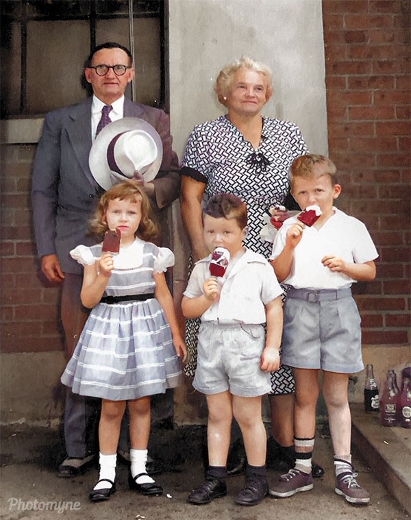 Fred. Kathie and Gary enjoying ice cream with Grandma and Pop. 1954