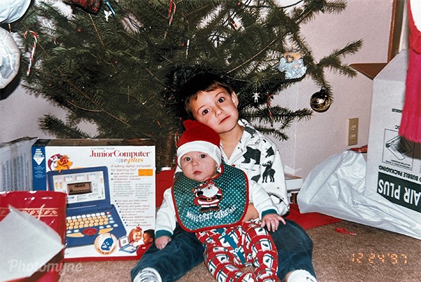 Christmas Eve 1997. A childhood moment beneath the Christmas tree.