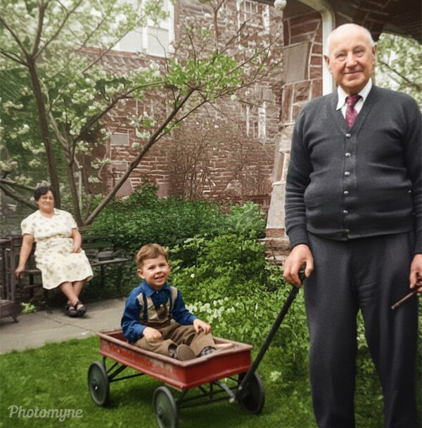 Grandpop Sorger pulling me in the wagon as Grandmom Sorger watches