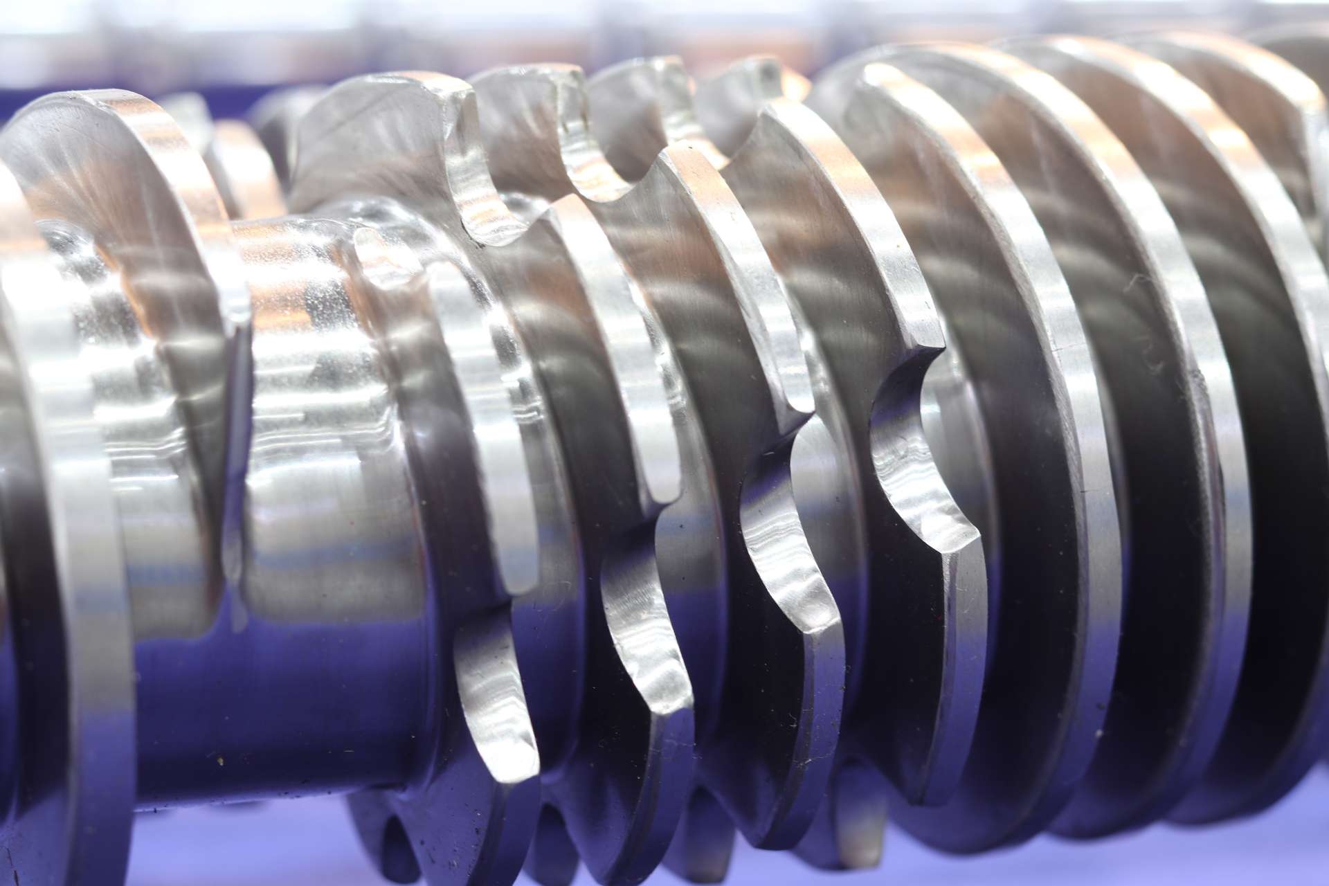 Are there any industry-specific standards or guidelines for mitigating screw erosion from shear forces?