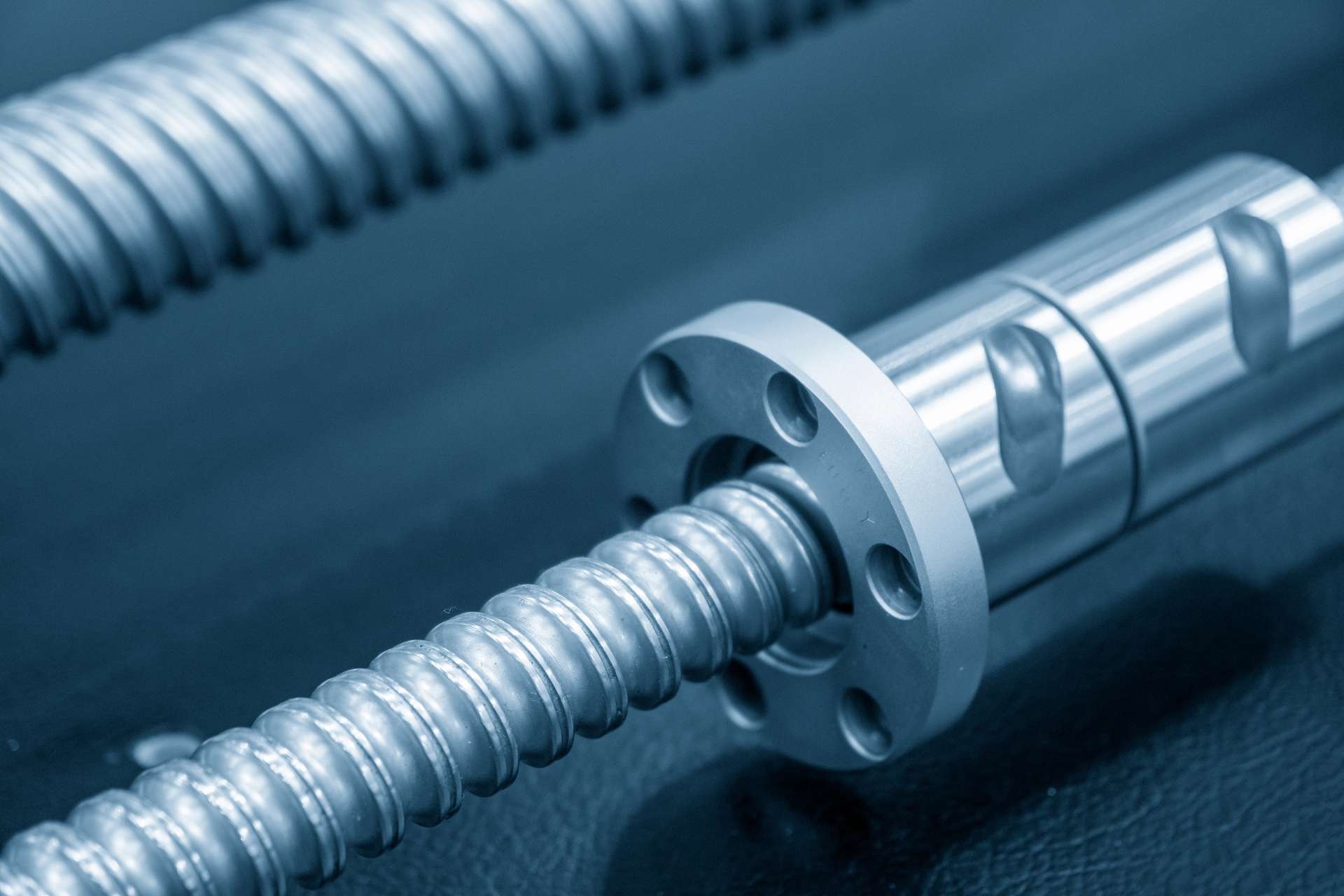 What are the potential consequences of screw wear on the overall system?