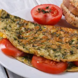 Omelette spinaazje, cherry tomaten en poddestuollen mei rys