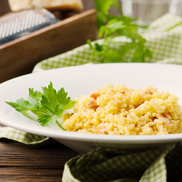 Saffron Risotto with Prosciutto Cotto, Peas and Parmesan Rovagnati