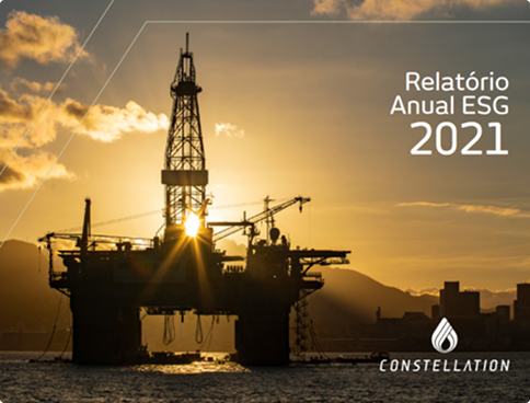 Cover of a digital document titled '2021 Annual ESG Report'. The background image shows the dark silhouette of a drilling platform against a golden sunset sky, with the Constellation logo in white in the bottom right corner.