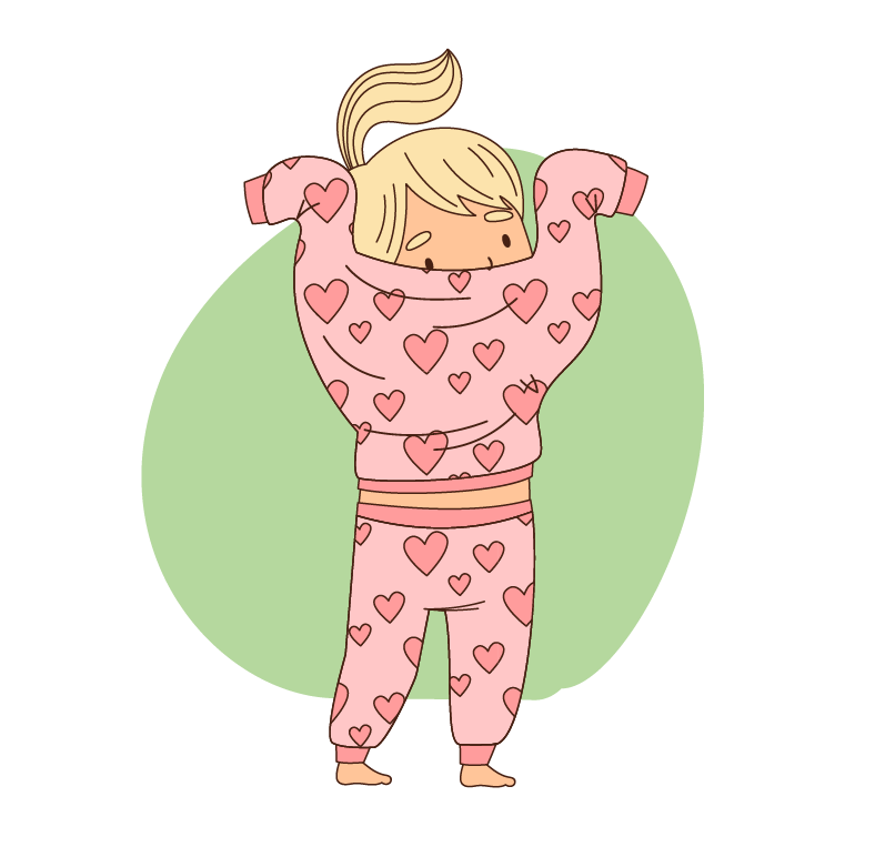 girl putting on pajamas
