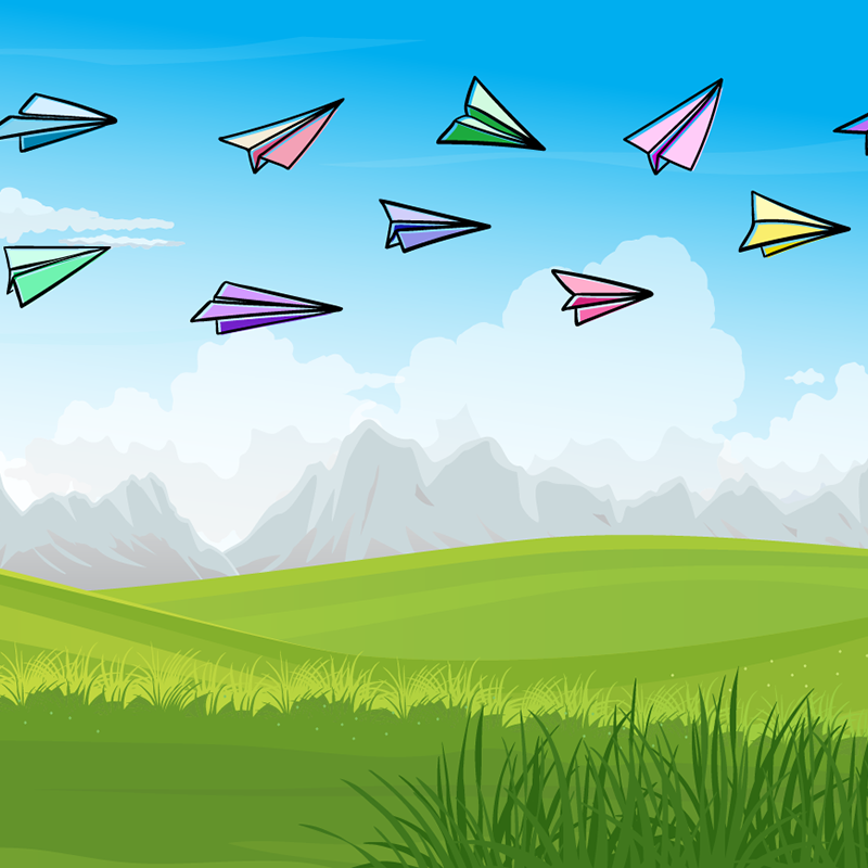 Paper airplanes flying in the field.
