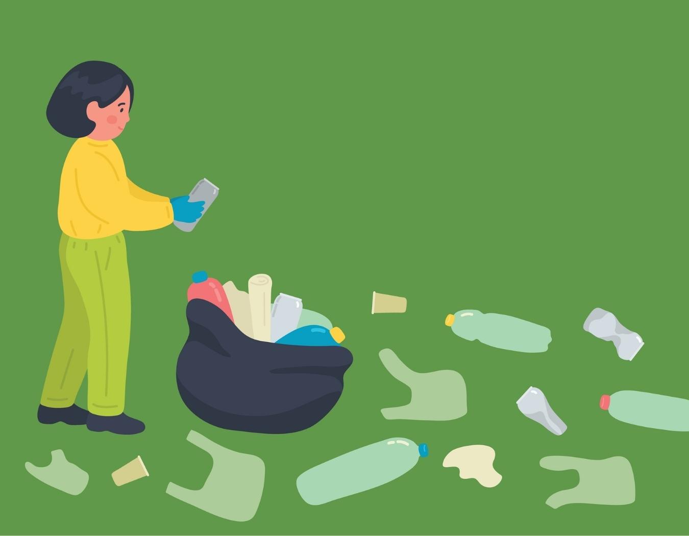 Child cleans up outdoors. Child picks trash.