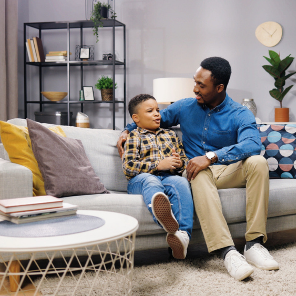 living room with decoration, furniture, father and child.