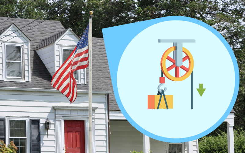 flagpole in fount of a house.