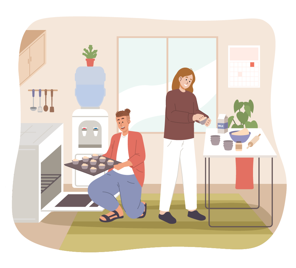 People cooking muffins in the kitchen with an oven.