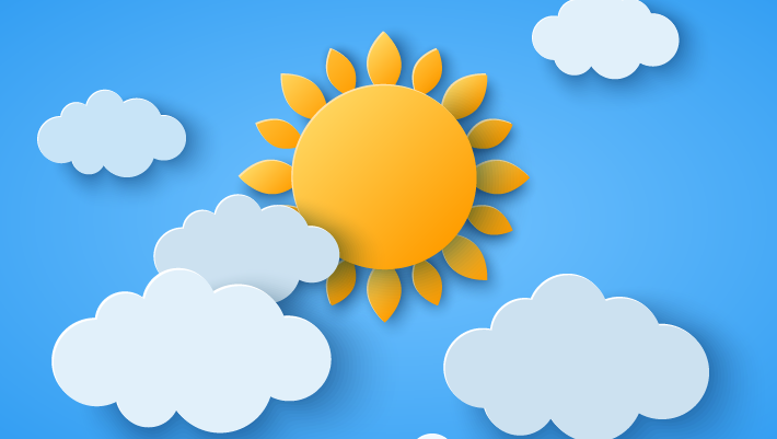 Sunny, blue sky with a few clouds.