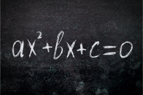 equasion written on a black board