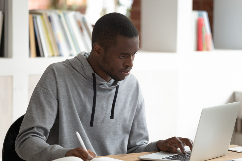 young man typing
