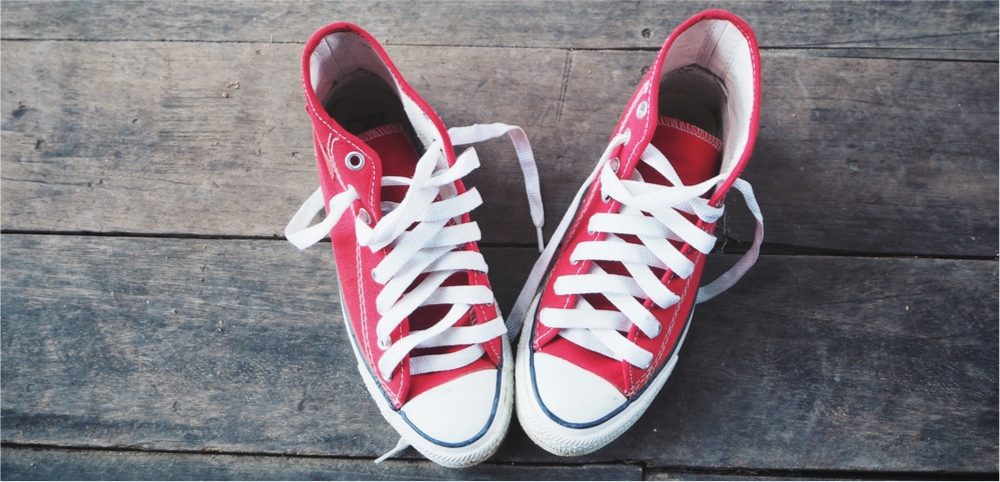 pair of red sneakers