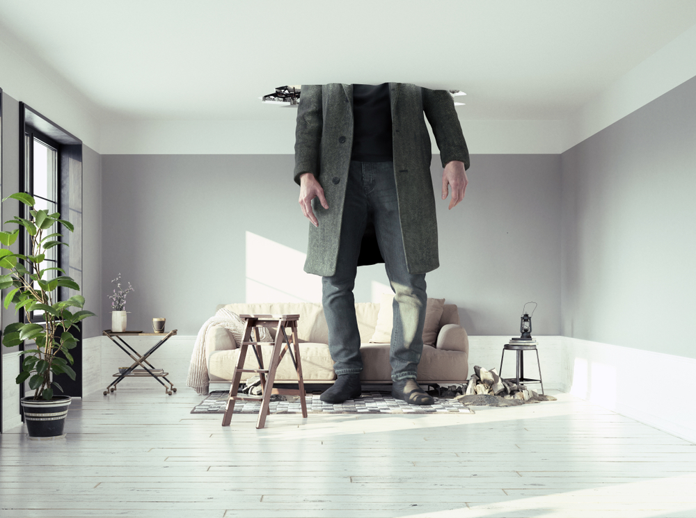 large man standing through ceiling