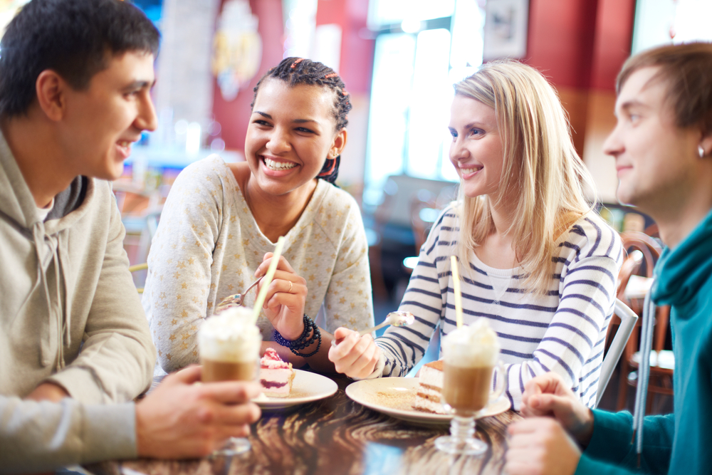 group of people eating dessert