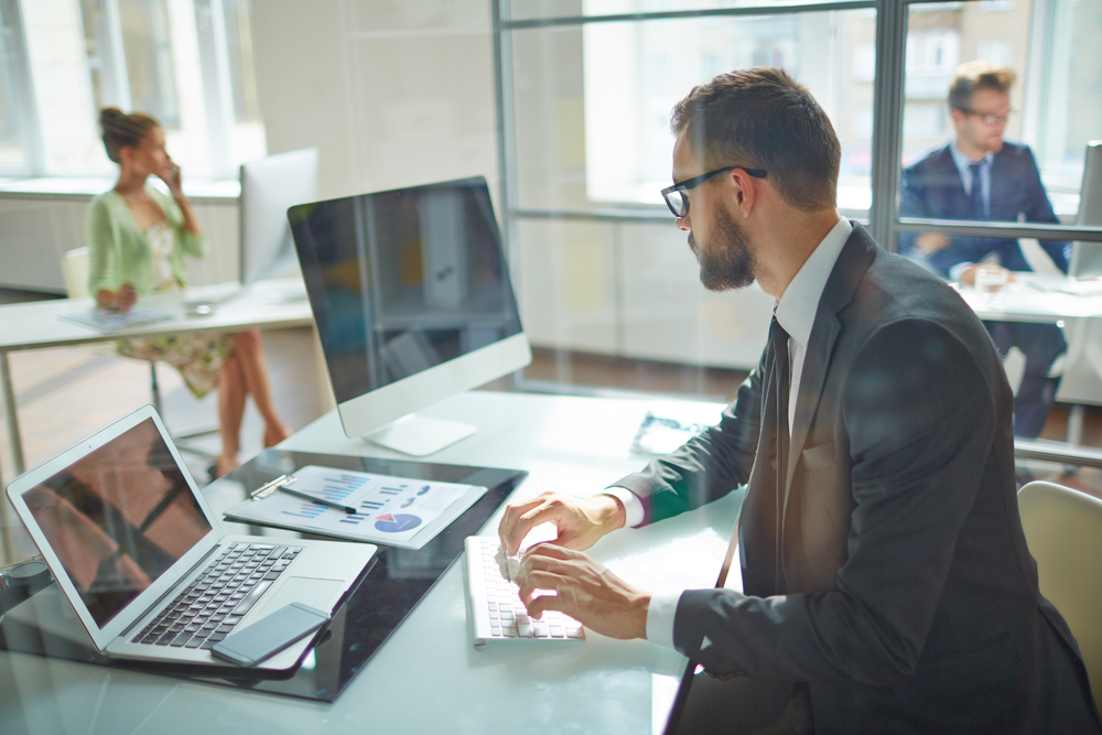 man working at computer