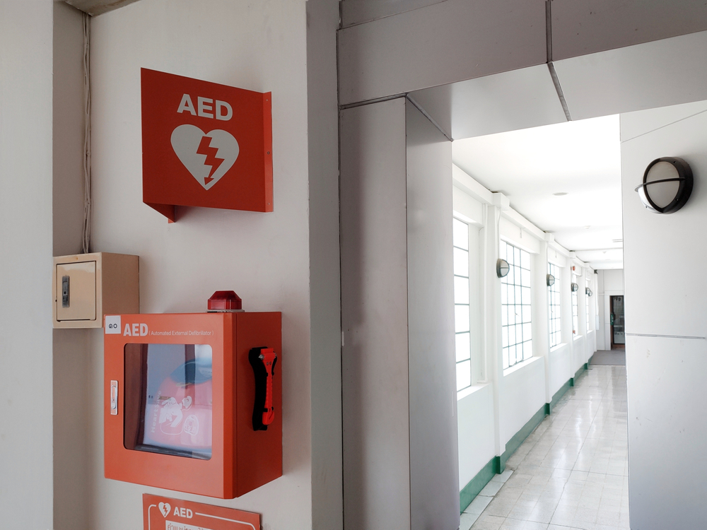 a. e. d. mounted in a hallway of an institutional building