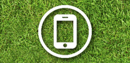 graphic of phone in a circle on a grass background