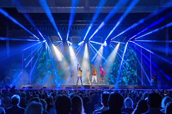 A five-piece pop group performing in the Pavilion
