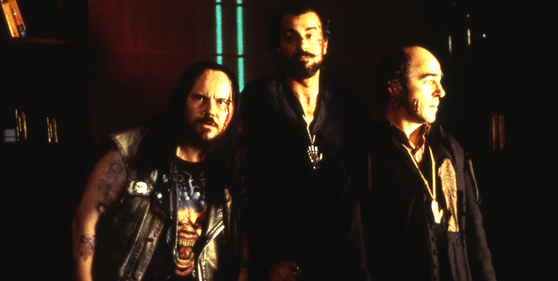 three heavy metal-looking dudes