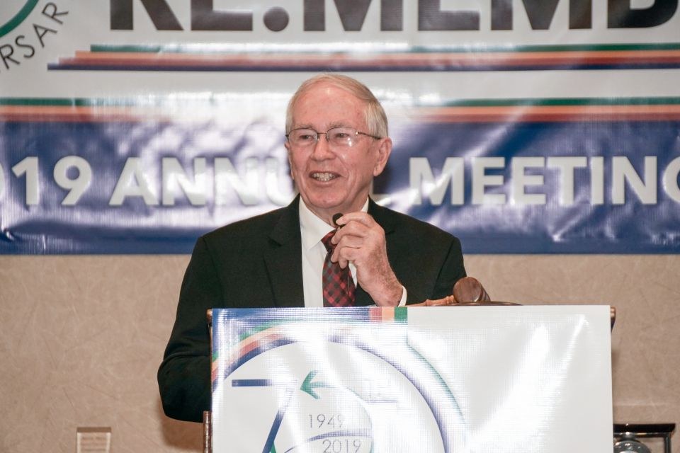 Photo of Don Applegate speaking at podium