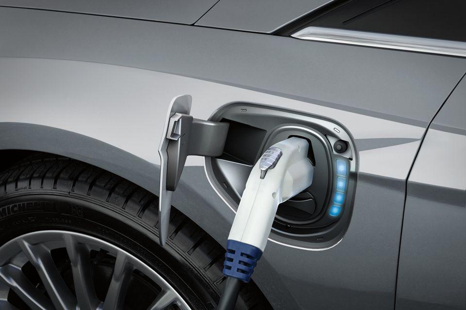 Photo image of an electric vehicle charger plugged into an electric vehicle. Electric vehicles, like the Ford Focus BEV shown here, reduce exhaust emissions. Photo Credit: Ford Motor Company.