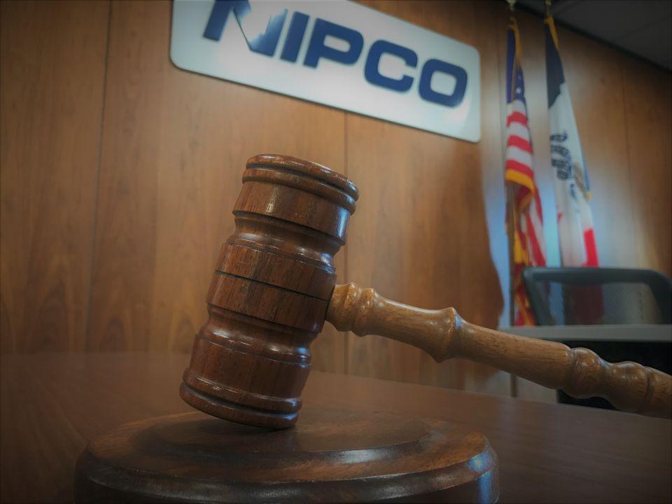 Photo of the Board of Directors gavel resting on a table in the NIPCO Board room.