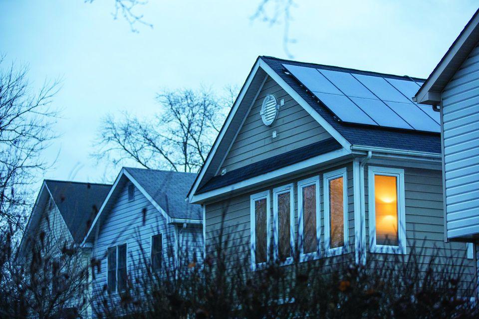 Photo image of solar panels on the roof of a house.